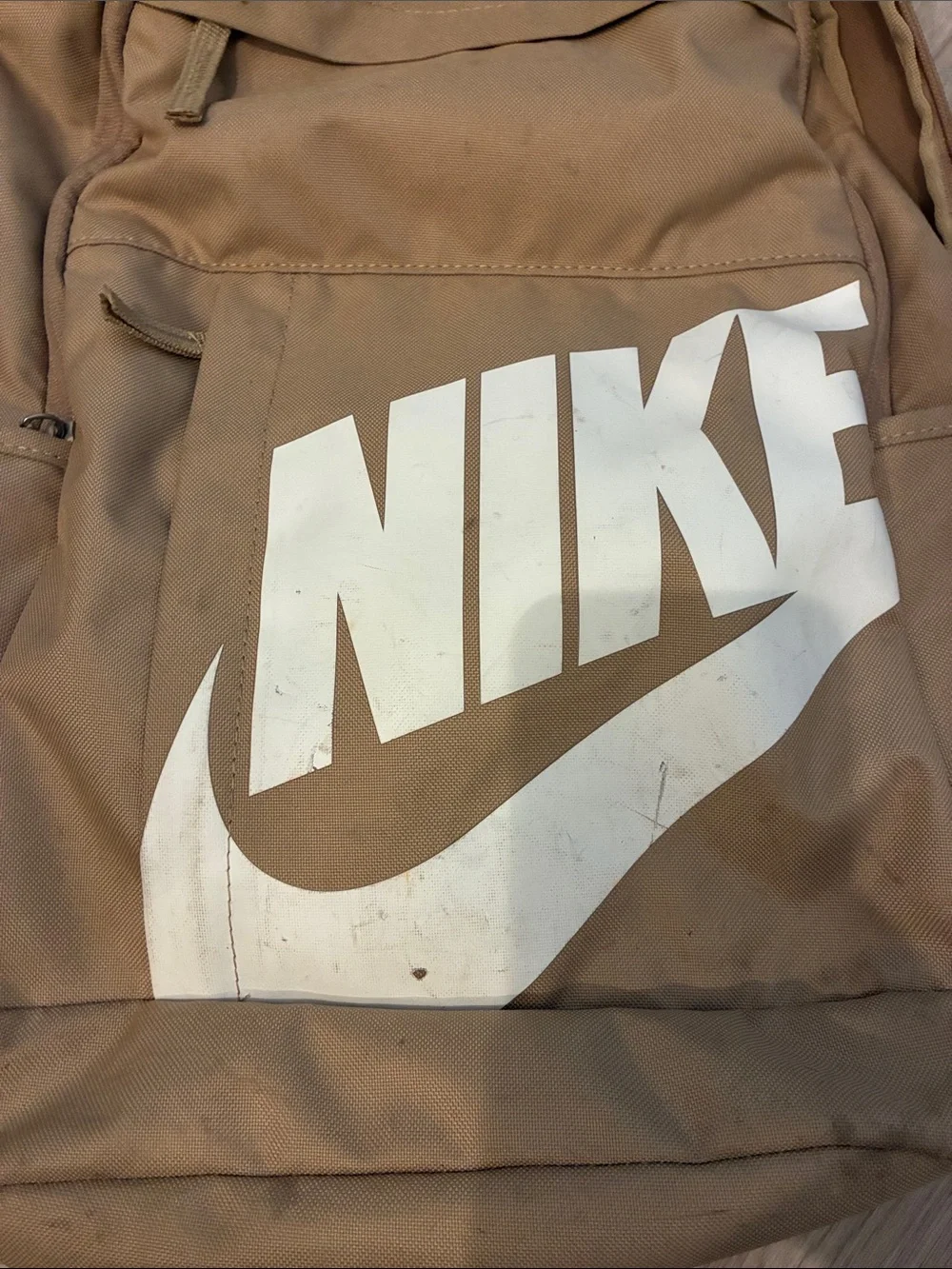 Nike Tan Backpack with White Swoosh Logo
